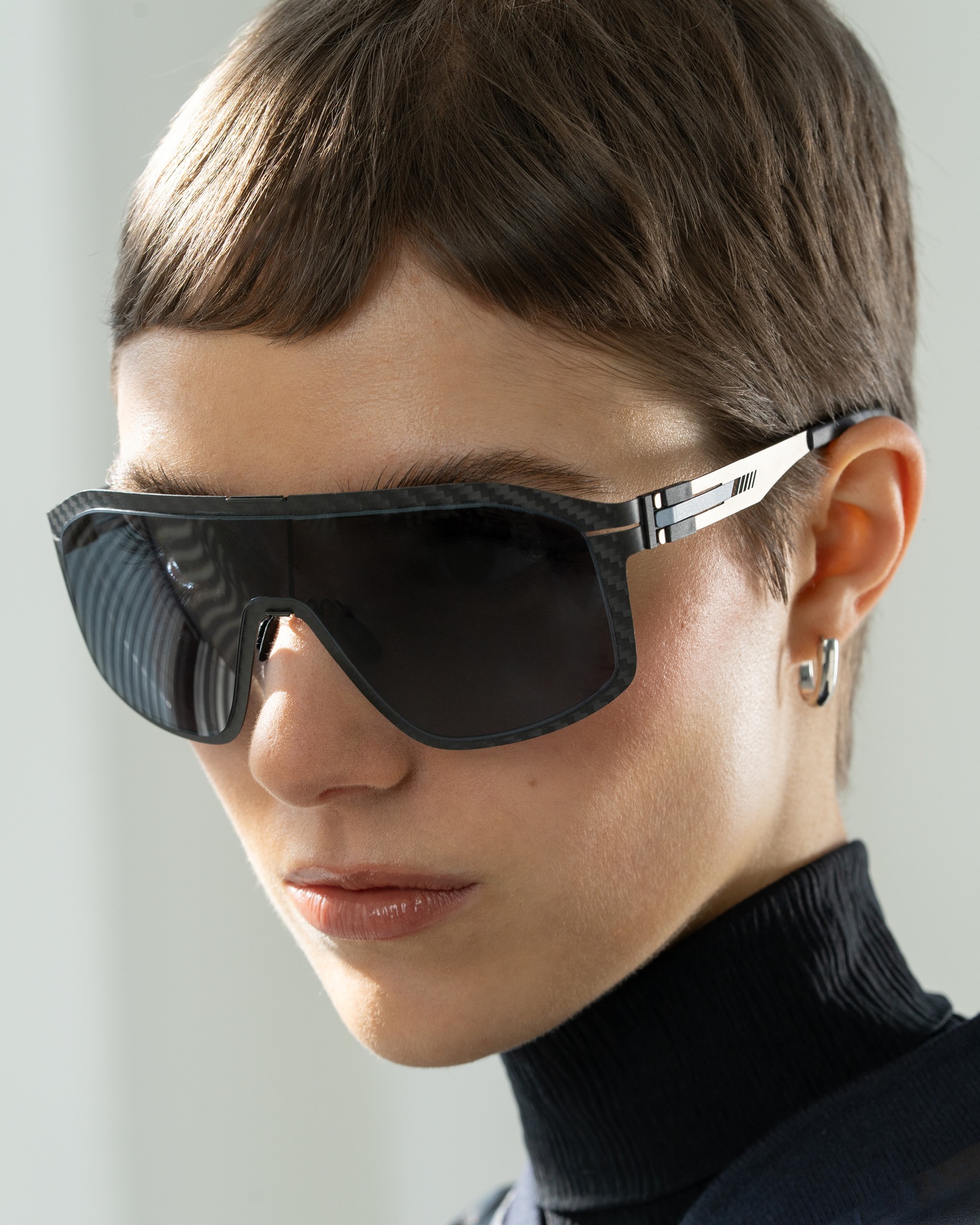 woman in shield sunglasses